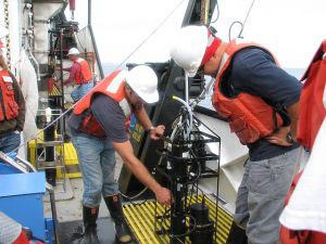 Mr. Tony Prestigiacomo, Researcher of the Upstate Freshwater Institute, Syracuse, NY, preparing to launch an optics measuring instrument